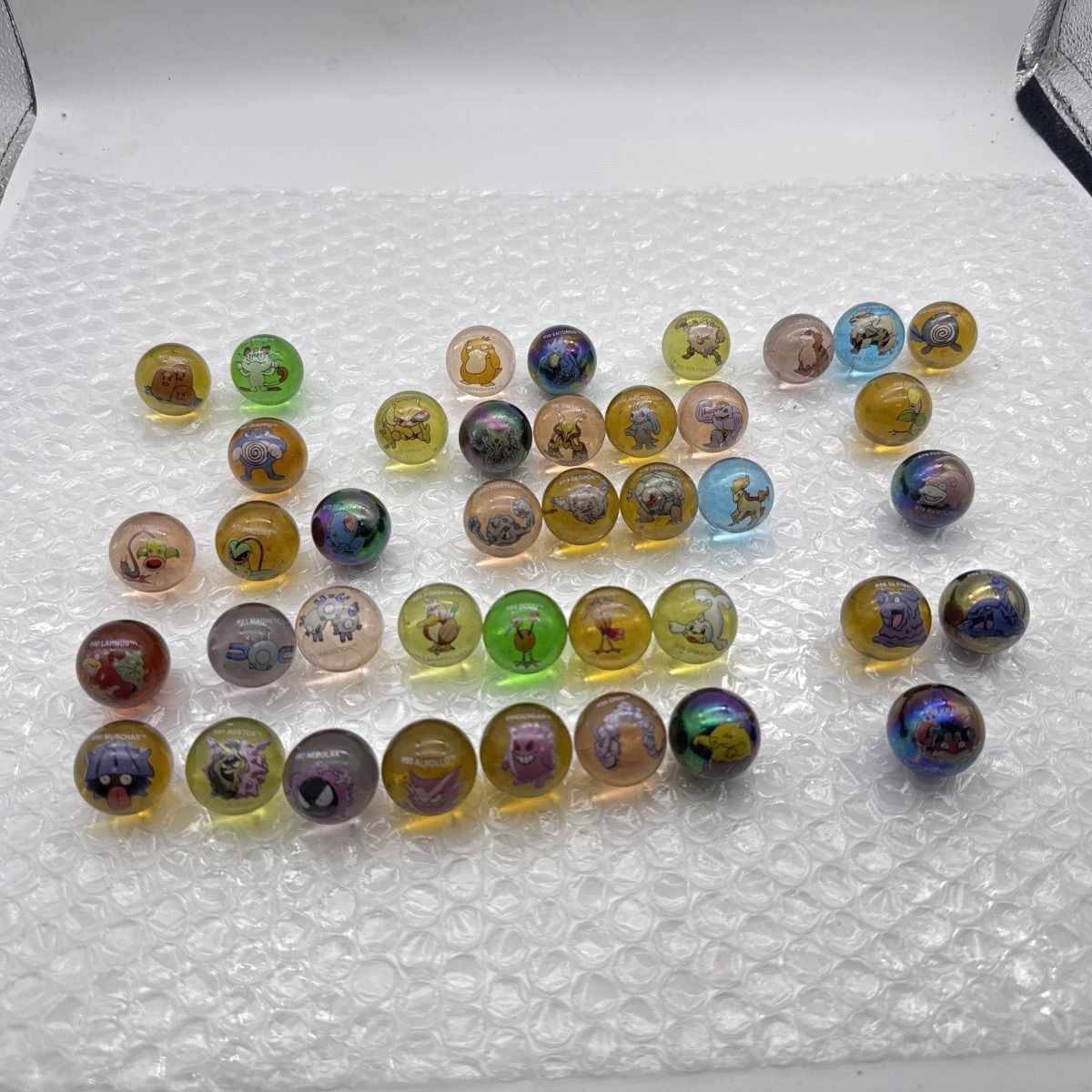 بضائع بوكيمون الرسمية بالجملة، - مراجعة Vintage Collectible Marbles وسعره